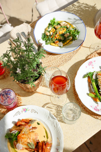 istock Serving Gourmet Dinner at Sunny Restaurant Terrace 2157822792