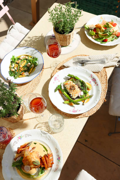 istock Serving Gourmet Dinner at Sunny Restaurant Terrace 2157822796