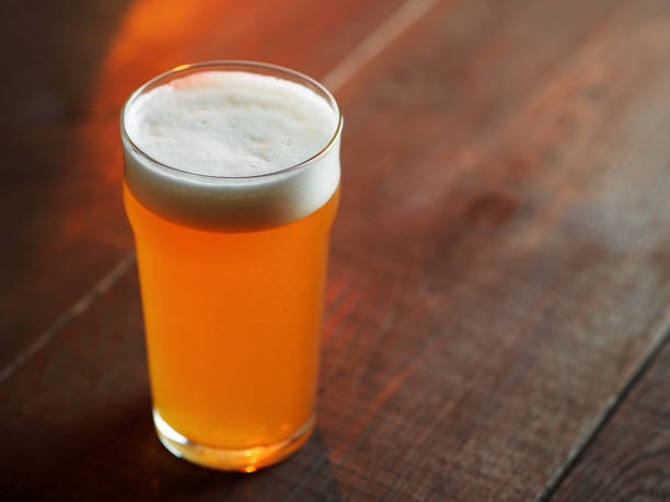 istock Beer glass on a wooden table with copy space 2157824205