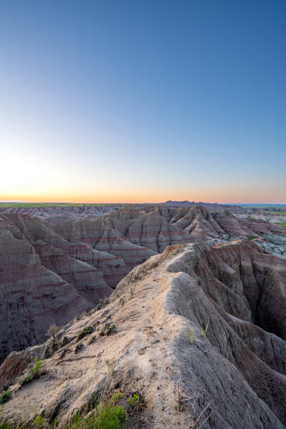 istock Vibrant Sunrise Over Panorama Point's Beautiful Geological Rock Formations in Badlands National Park in South Dakota USA 2157827765