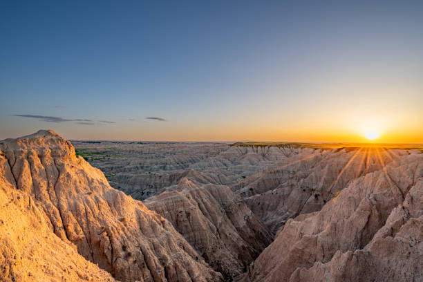 istock Vibrant Sunset Over the Beautiful Geological Rock Formations Around Pinnacles Overlook in Badlands National Park in South Dakota USA 2157828024