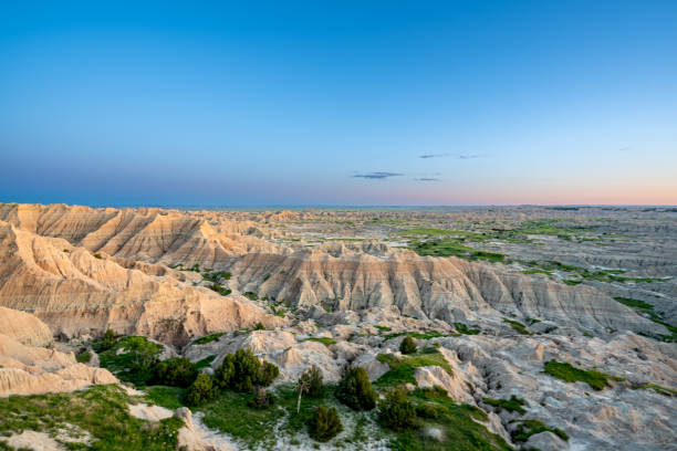 Vibrant Sunset Over the Beautiful Geological Rock Formations Around Pinnacles Overlook in Badlands National Park in South Dakota USA