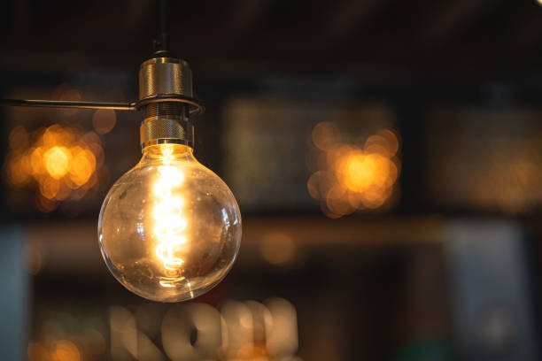 istock A classic tungsten lightbulb for interior decoration. 2157829004