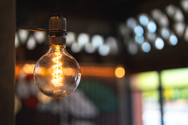 istock A classic tungsten lightbulb for interior decoration. 2157829019