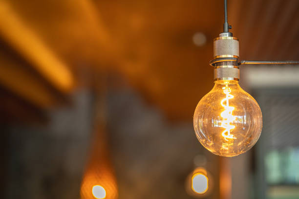 istock A classic tungsten lightbulb for interior decoration. 2157829047