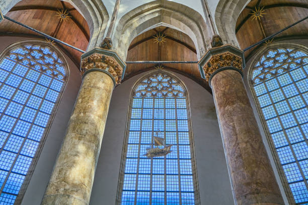 Amsterdam,Holland - August 12, 2023: A small ancient vessel in the apse of the Old Curch