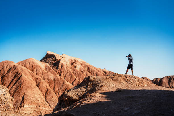 istock Lone Explorer Capturing Rock Formations in Atacama, Chile 2157829789