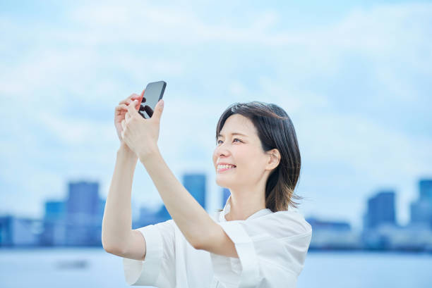 istock A young woman operating a smartphone 2157835164