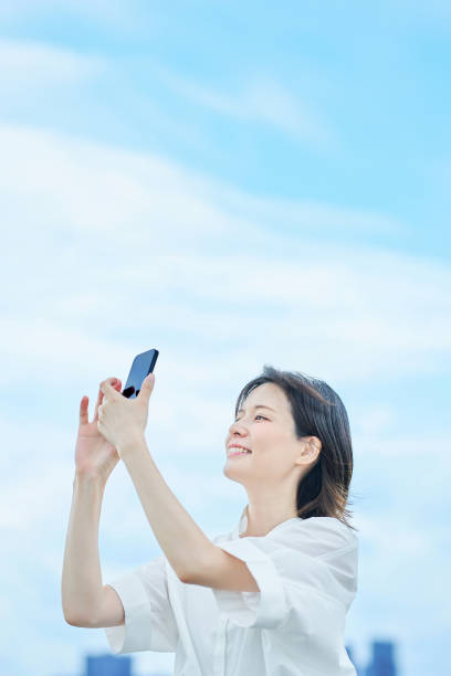istock A young woman operating a smartphone 2157835184