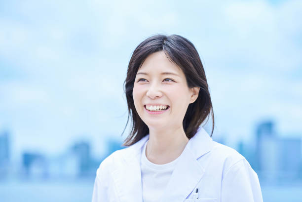 istock Young woman wearing a white coat 2157835489