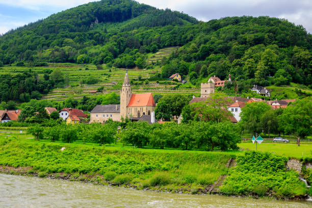 Scenic view mountain and village viewing while cruising the River Danube in Lower Austria