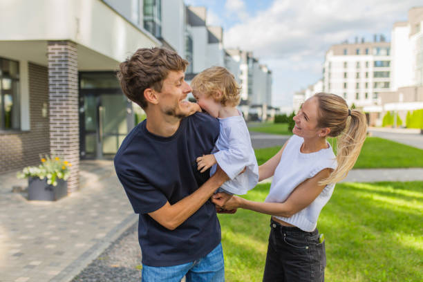 istock Happy family in the yard. 2157841350