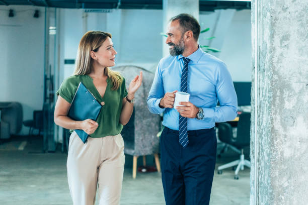 Business colleagues talking in the office