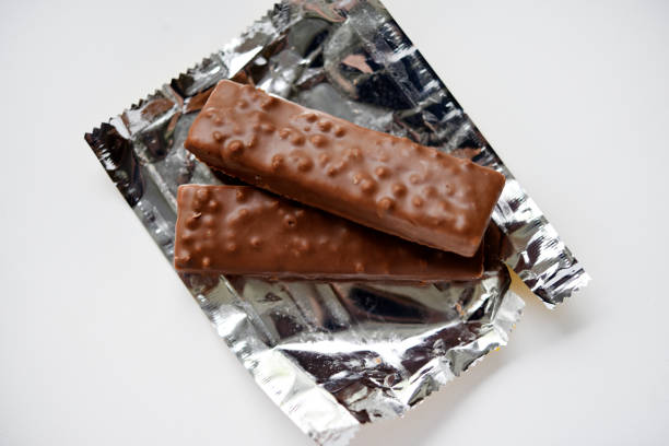 A sweet chocolate bar in a package. A waffle chocolate bar.