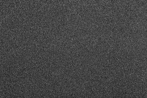 istock Pile of black quartz sand as background, top view. Crushed quartz. 2157845309
