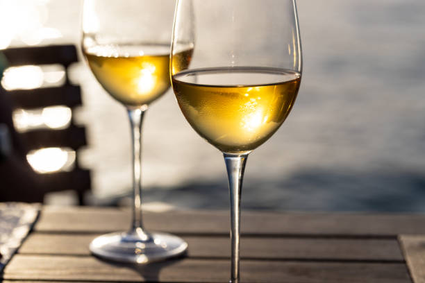 istock Two glasses of wine on the table 2157855326