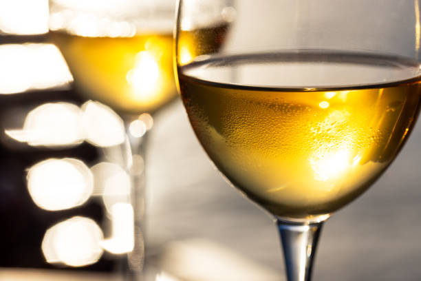 istock Two glasses of wine on the table 2157855339