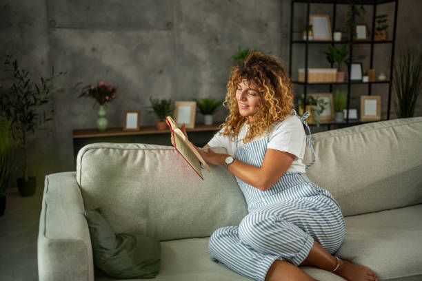 istock Morning bliss, I love this quiet moment reading a good book 2157860433