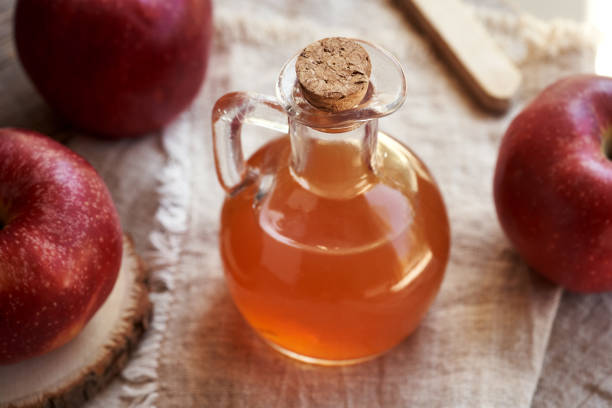 istock A bottle or jug of apple cider vinegar 2157863677