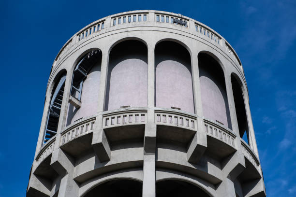 Debrecen Big Forest Nature Conservation Area. A water tower is an elevated structure supporting a water tank constructed at a height sufficient to pressurize a distribution system for potable water.