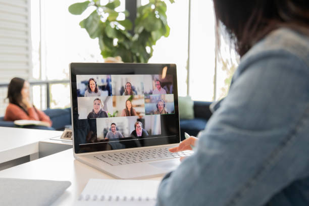 istock Woman attends video conference meeting while working in modern coworking office space 2157866135