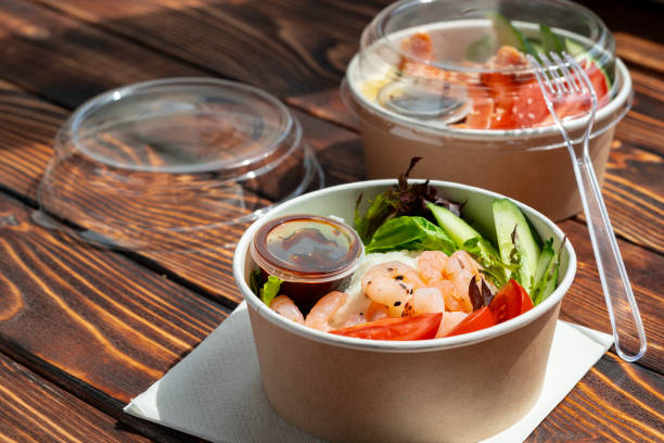 istock Take out poke bowl on wooden background 2157877636