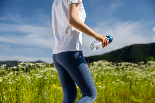istock athletic, woman, jogging 2157878996