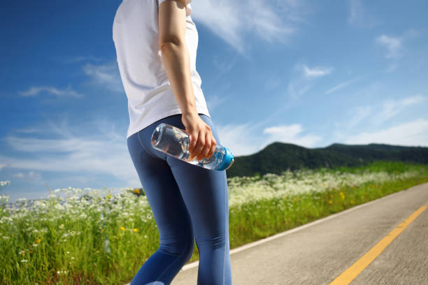 istock athletic, woman, jogging 2157878997