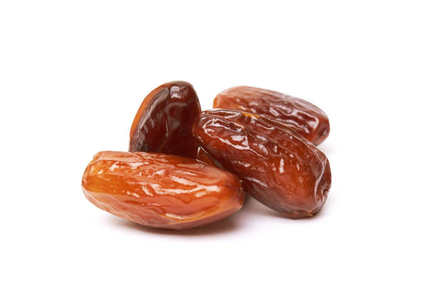 istock Dried dates fruits on white background 2157882386