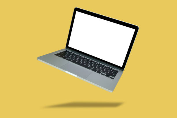 istock Laptop with blank screen isolated on yellow background 2157883694