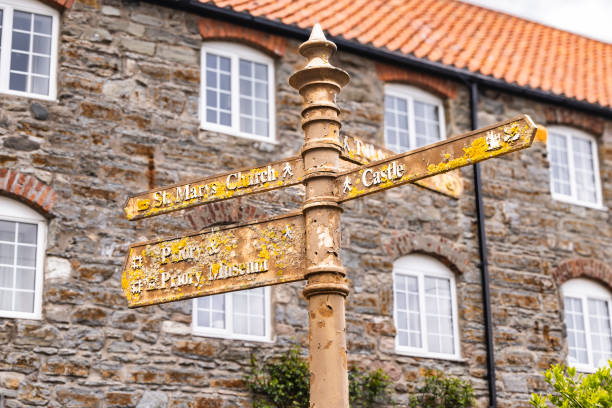 istock Directional sign on Holy island. 2157888018