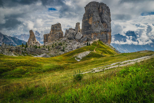 istock Green meadow and Cinque Torri rock formations, Dolomites 2157890260