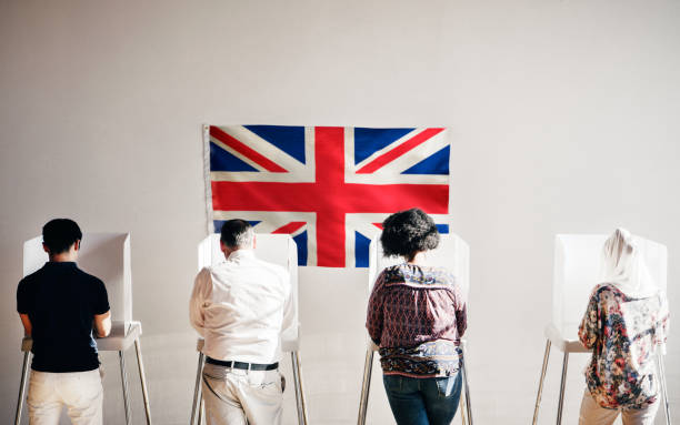 British people in a polling booth