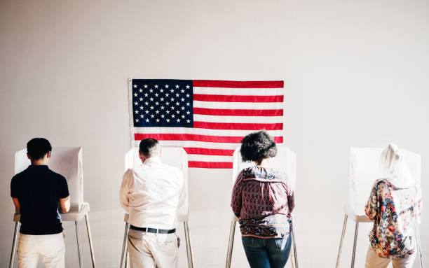 istock American at a polling booth 2157894496
