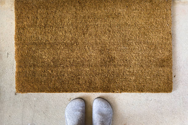 istock Shoes And Door Mat 2157894728