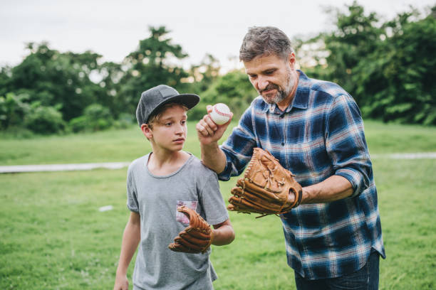 istock Father and son bonding over baseball 2157899585