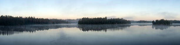 istock panorama of a forest lake on a summer morning 2157900794