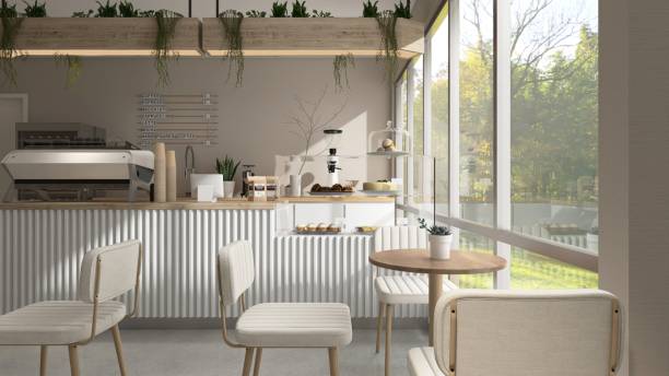 istock Modern, cozy beige cafe and bakery with counter, professional espresso machine, cake display, tables, chairs, window to backyard 2157905115