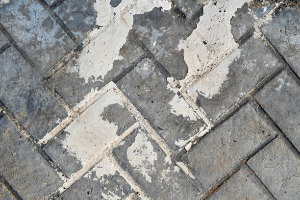 istock Dirty old unclean stamped concrete floor. 2157911550