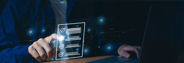 istock checklist Complete the performance review digital form checklist.business people using evaluation questionnaire evaluation 2157911710