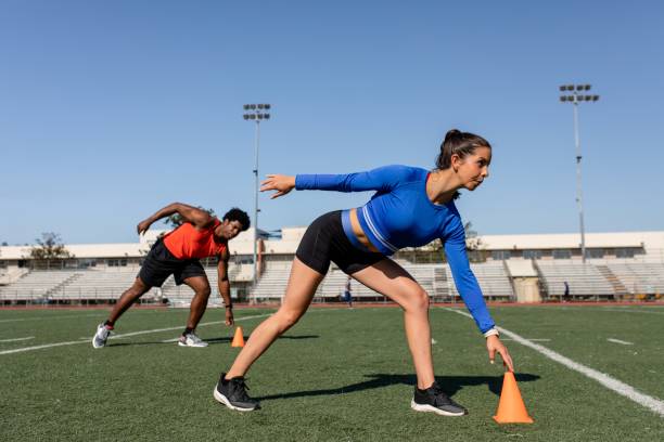 istock Man and woman athletes practicing and drilling 2157912195