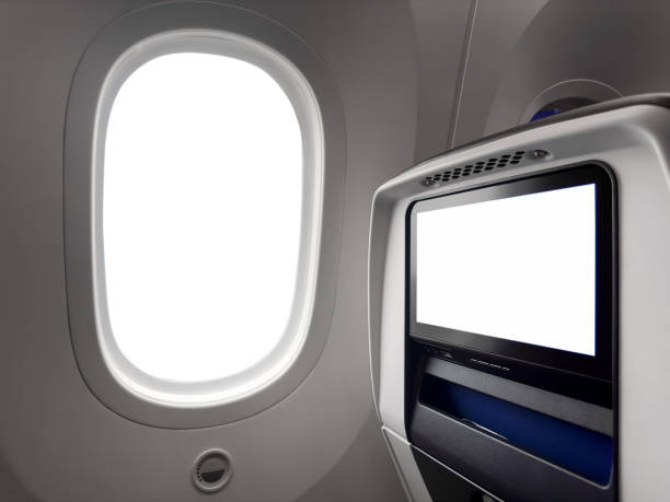 istock Commercial airplane window seat with entertainment screen 2157913249