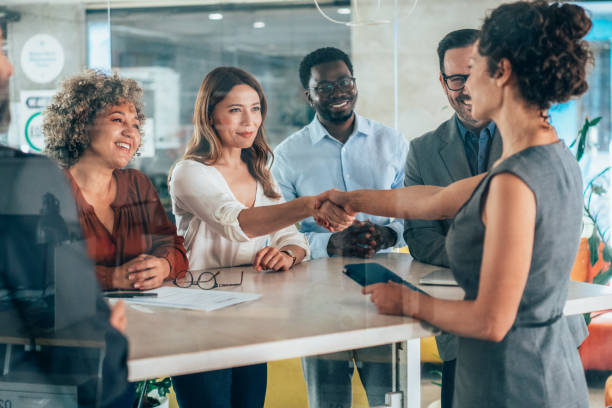 istock Shaking hands with new colleague 2157914685