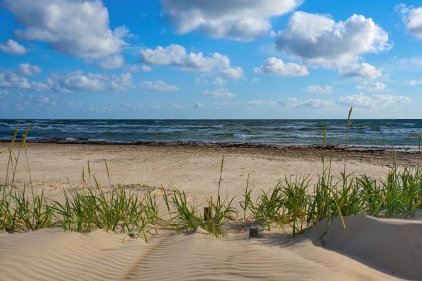 istock Seascape. Cloudy sky, sandy beach. Summer weather. 2157914720