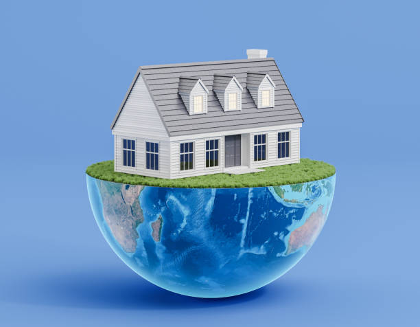 istock Big house on grass and half Earth on blue background 2157915345