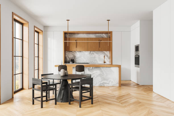 istock Luxury home kitchen interior with bar island and dining table, panoramic window 2157915716