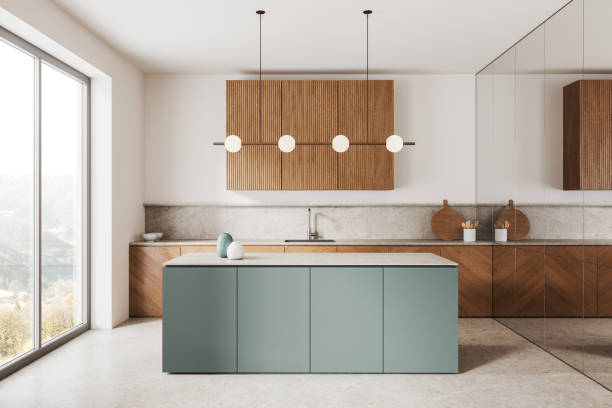 istock White and gray kitchen interior with island and wooden cupboards 2157915749