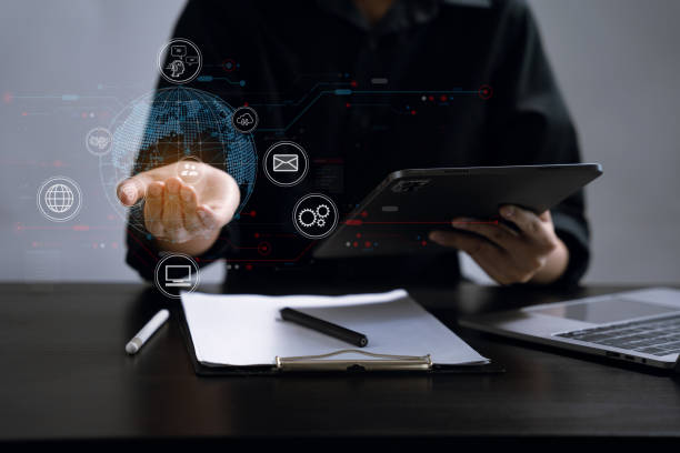 istock Digital marketing media in virtual icon globe shape business open his hand, working touch screen tablet. 2157916085