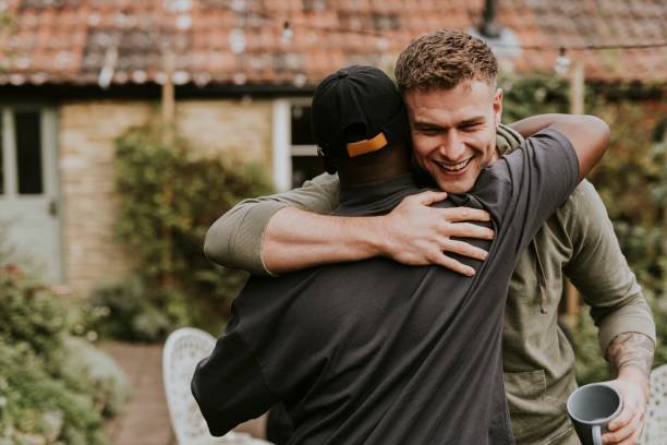 Friends hugging each other at a party