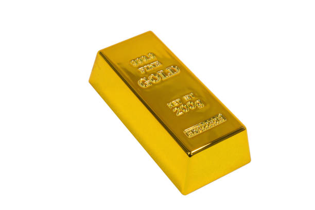 Close up photo hand holding a gold bars on black background